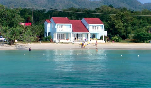 On the beach, sun loungers, beach towels