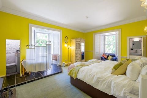 King James- In the original tower with views out to the woodlands. SK or Twin 