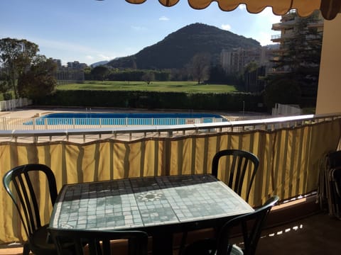 Terrace with view over pool and golf
