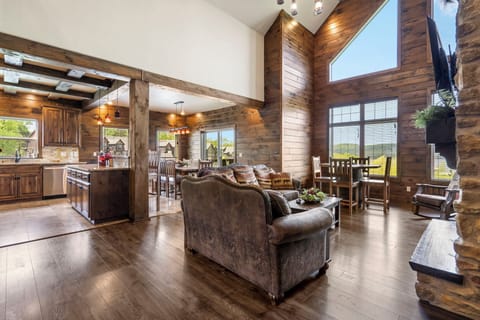 Spacious, main level living room, open to the kitchen and dining room