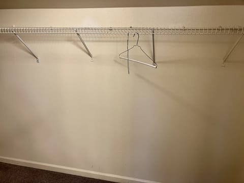 This large walk in closet in the master has room for everything