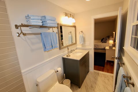 Combined shower/tub, hair dryer, towels, soap