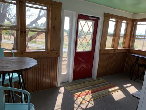 The front room is perfect for enjoying a cup of coffee and soaking in the views.