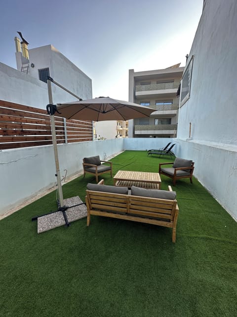 Top floor Terrazza with Astro turf, sun loungers and outdoor shower.