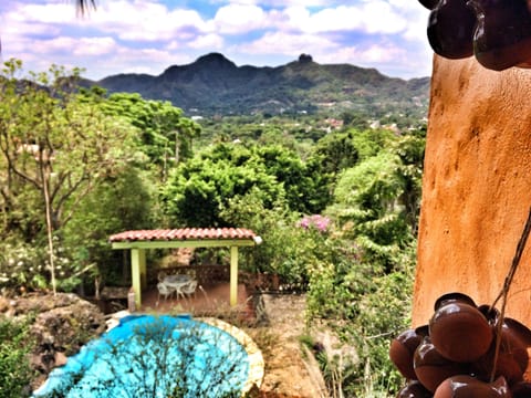 Take a dip in the pool carved out of volcanic rock.