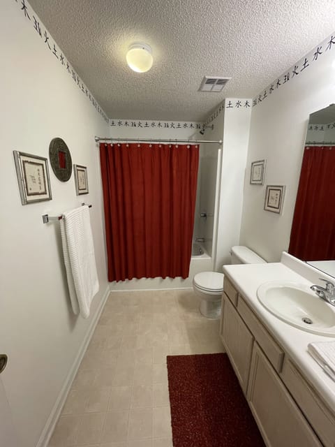 Combined shower/tub, hair dryer, towels, soap