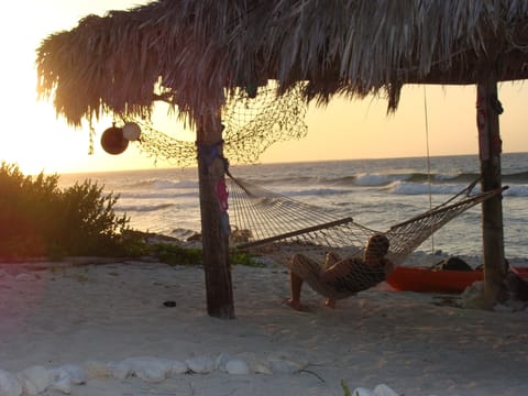 On the beach, sun loungers, beach towels