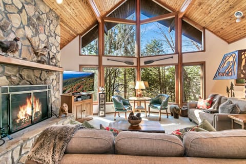 Main Lining Area with Stone Fireplace, Huge Windows and 19-foot Cedar Ceiling.