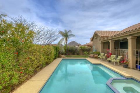 Outdoor pool, a heated pool, sun loungers