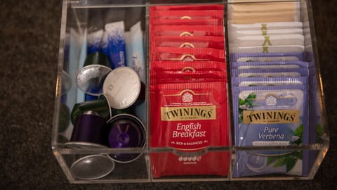 The tea/coffee caddy will be stocked and you can buy coffee capsules in town