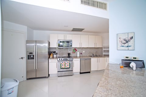 Fully equipped kitchen with walk in pantry
