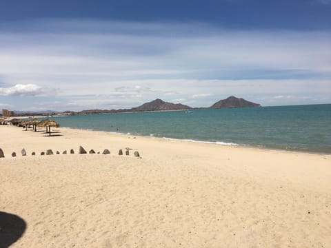 On the beach, sun loungers