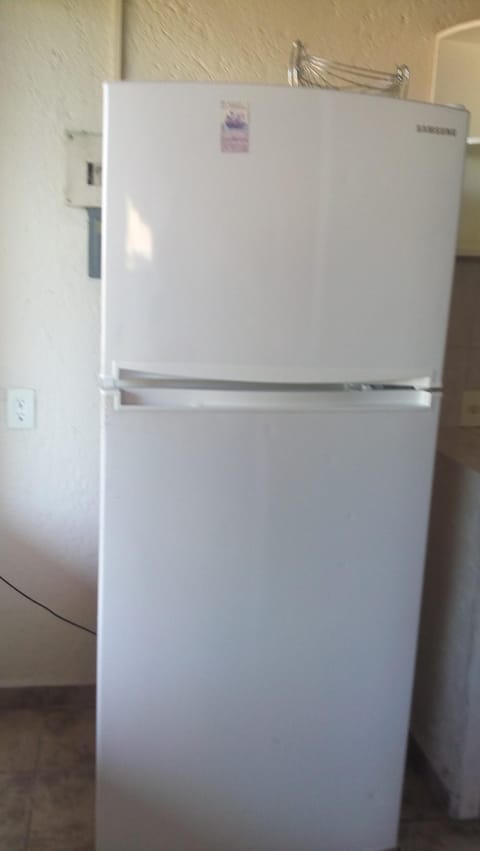 Fridge, microwave, stovetop, cookware/dishes/utensils