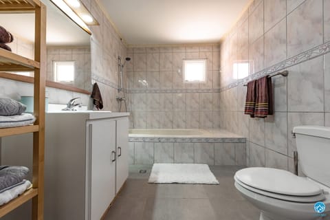 Combined shower/tub, hair dryer, towels, toilet paper