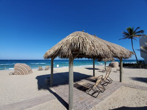 On the beach, sun loungers, beach towels