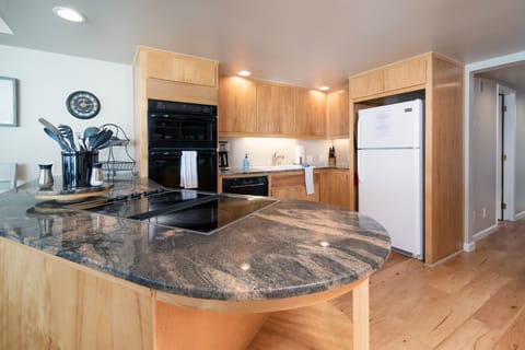 Well stocked, open kitchen so the chefs of the group don't miss out.