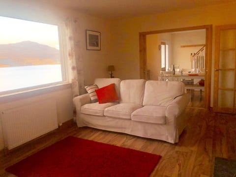 Comfortable lounge overlooking sea and hills