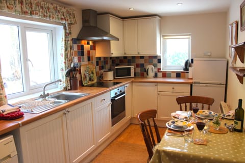 Lots of light with views across the wood and to the bird feeder.