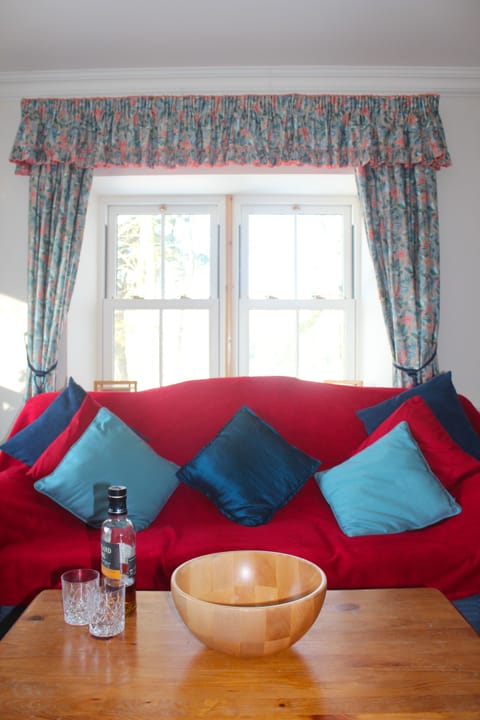 Top of the range sofa and soft furnishings.