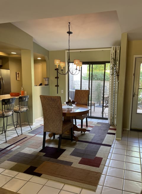 Dining table and view onto front patio