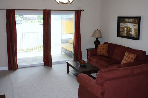 Living room with view of water-Typical 2 BR unit-All units are furnished similar