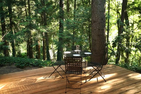 Our private deck with calming forest views. Perfect for eating or having a drink