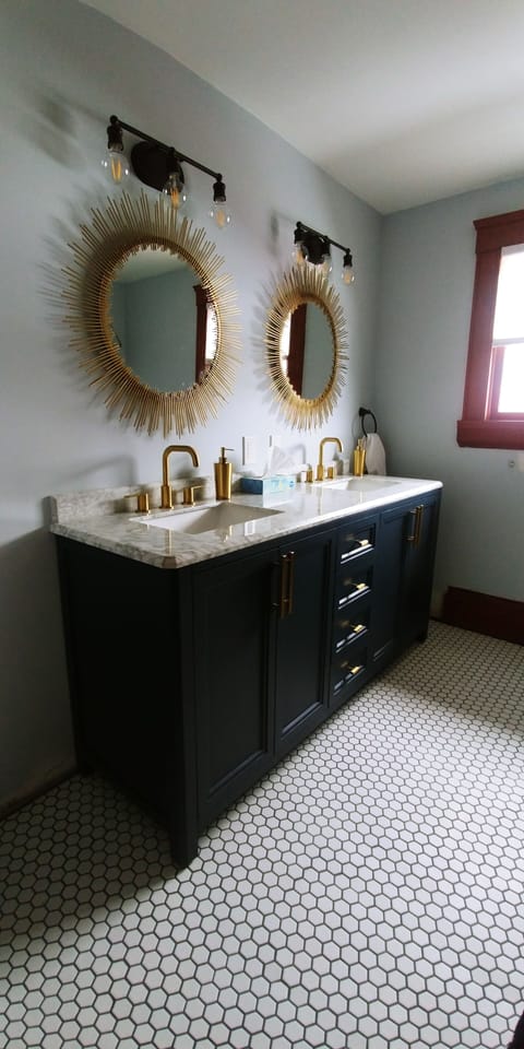 Newly renovated 2nd floor bathroom - double sink.