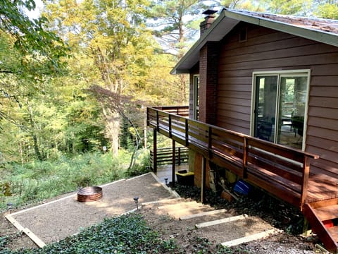 Back of House & driveway on KNOLLWOOD, with new firepit area   (2020).