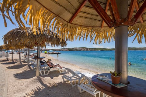 Beach nearby, sun loungers