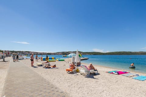 Beach nearby, sun loungers