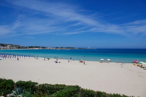 On the beach, sun loungers