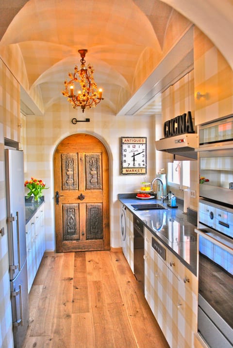 Fully stocked gourmet kitchen features beautiful local granite countertops and all new appliances