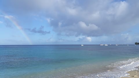 On the beach, sun loungers, beach towels