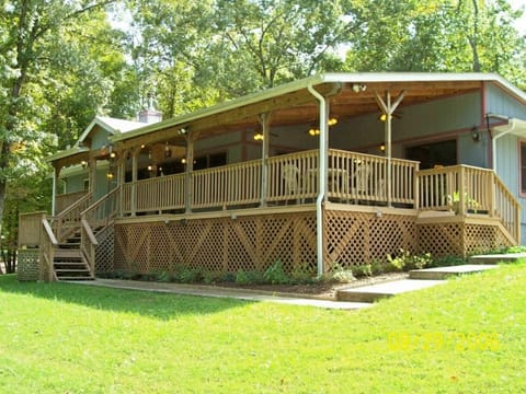 The Heights Lodge has a huge fan lit, covered deck to enjoy anytime of year.