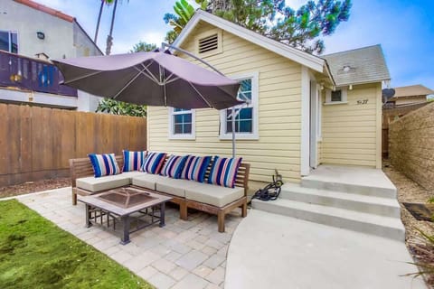 Front yard entertaining space with fire pit.