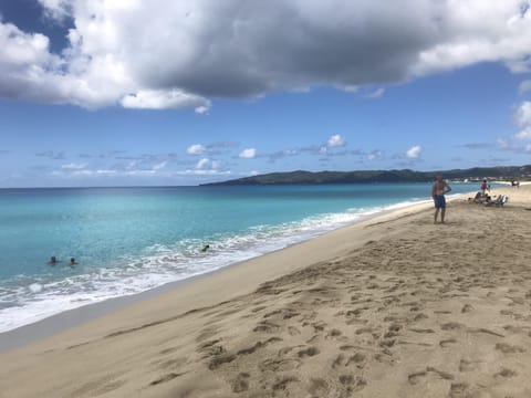 On the beach, sun loungers, beach towels