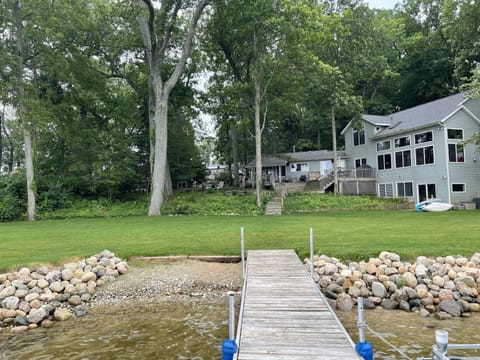 Water frontage 150ft with dock and walk-in to lake. 
