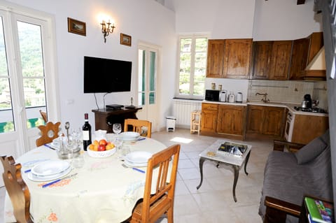 The modern kitchen and the lounge where you can watch satellite TV or use Wi-Fi.