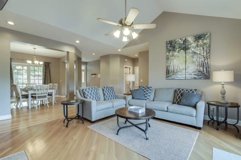 Spacious Family Room with adjacent Dining Room and Front Door beyond