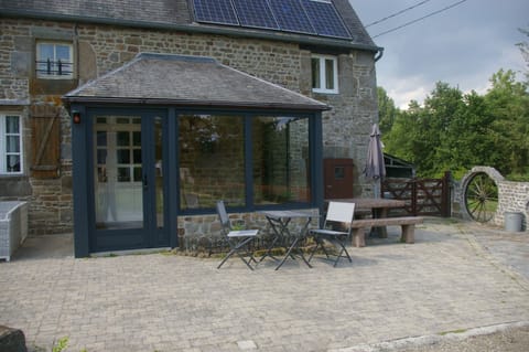 Front entrance porch/conservetory with seating areas