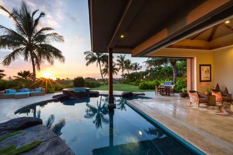 Ocean sunset over pool/spa adjacent to Living Room and Pool Pavilion