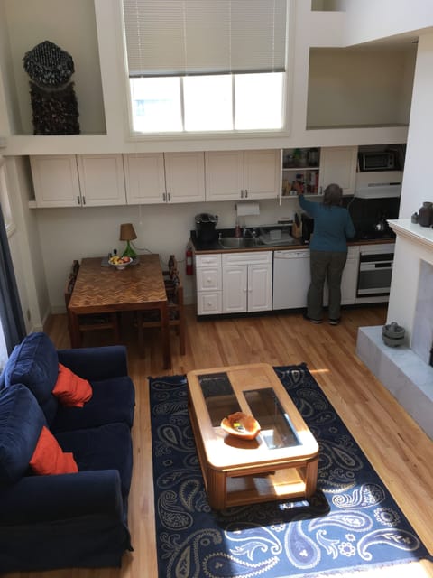 View from sleeping loft down to living room/kitchen area