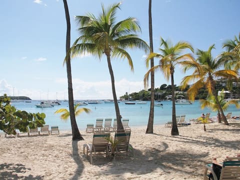 On the beach, sun loungers, beach towels