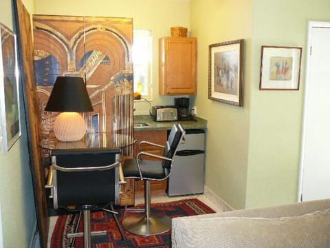 Kitchenette features min-frig, sink, Puck Oven, toaster, coffee maker, wash/dry