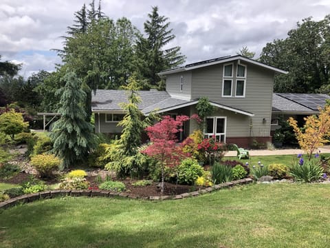Wrap around yard and gardens make it a very private setting tucked of the street