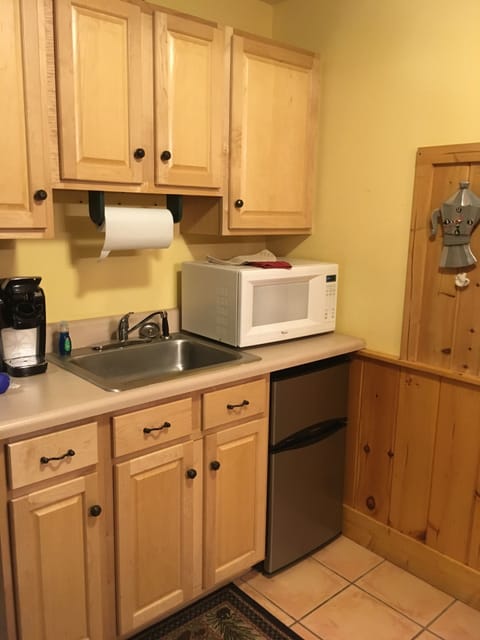 Fridge, microwave, coffee/tea maker, toaster