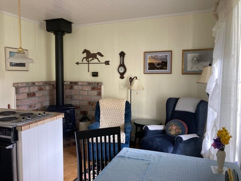 Kitchen Table Right Foreground - Gas Stove Left Rear