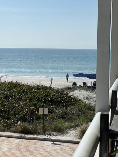 On the beach, sun loungers, beach towels