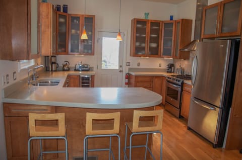 Large kitchen with breakfast counter