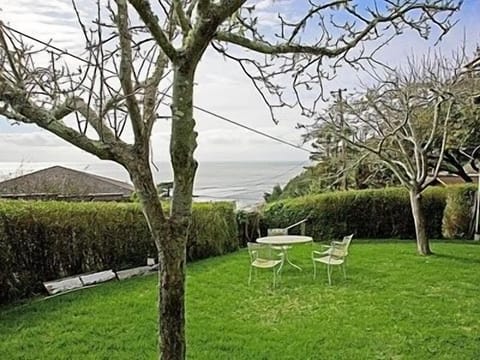 Private yard with ocean view. Very little street traffic or pedestrian noise.